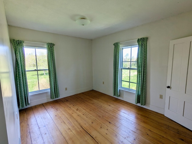 99 W Hamlet Rd, Newcastle, ME 04553 - empty room featuring hardwood / wood-style floors and healthy amount of natural light