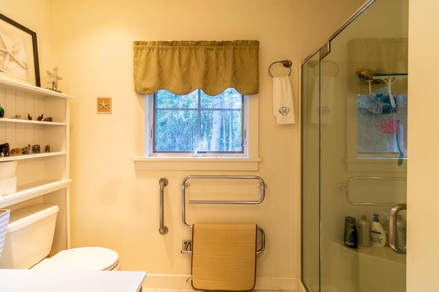 372 Pettegrow Point Rd, Machiasport, ME 04655 - full bathroom with a shower stall, toilet, and baseboards