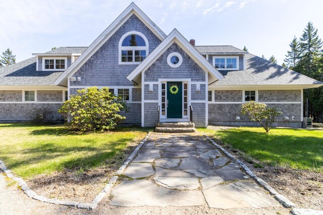372 Pettegrow Point Rd, Machiasport, ME 04655 - view of front of property featuring a front yard and a shingled roof