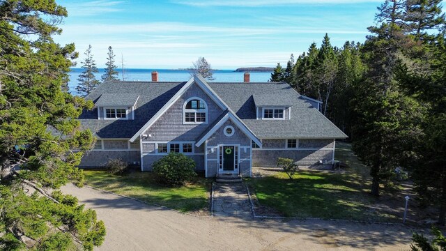 372 Pettegrow Point Rd, Machiasport, ME 04655 - shingle-style home featuring a chimney, a water view, a front yard, and roof with shingles