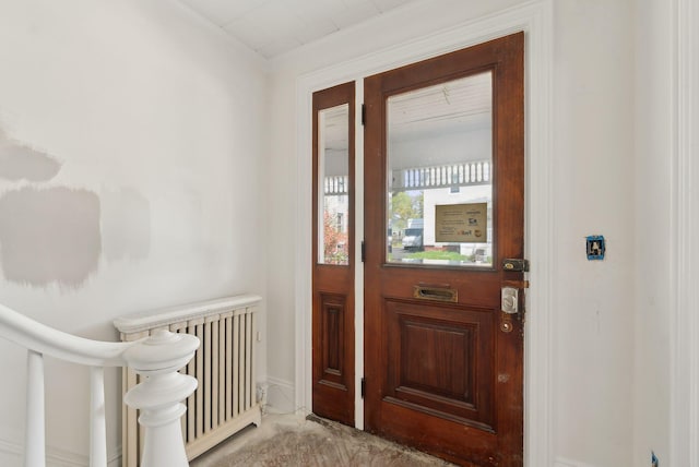 244 Concord St W, Portland, ME 04103 - foyer with radiator and baseboards