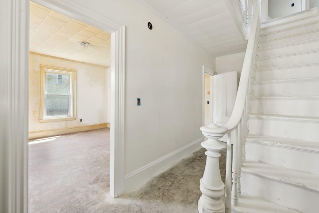 244 Concord St W, Portland, ME 04103 - staircase featuring baseboards and unfinished concrete floors