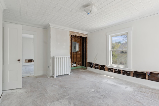244 Concord St W, Portland, ME 04103 - unfurnished room featuring radiator heating unit, ornamental molding, and electric panel