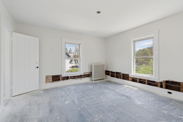 244 Concord St W, Portland, ME 04103 - spare room featuring radiator heating unit