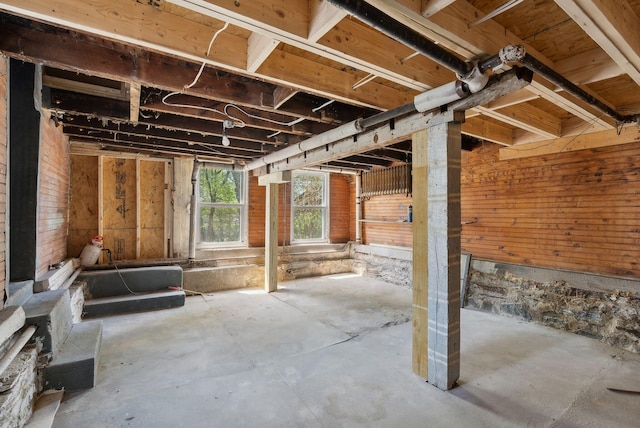 244 Concord St W, Portland, ME 04103 - misc room featuring unfinished concrete flooring and wooden walls