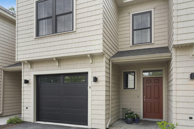 25 Preservation Ln Unit 9, South Portland, ME 04106 - property entrance with a garage