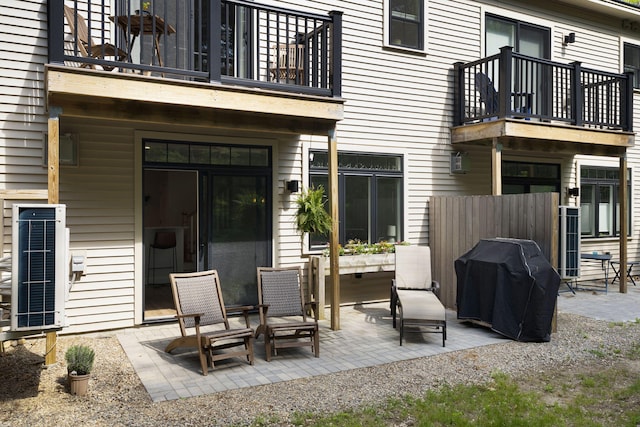 25 Preservation Ln Unit 9, South Portland, ME 04106 - view of patio with a balcony, area for grilling, and fence