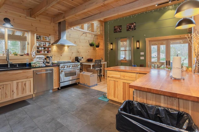 26 Christen Rd, Kingfield, ME 04947 - kitchen with island exhaust hood, stainless steel appliances, a sink, wood ceiling, and wooden counters