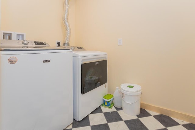 26 Christen Rd, Kingfield, ME 04947 - clothes washing area featuring light floors and washing machine and dryer