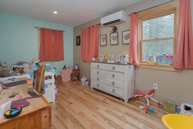 26 Christen Rd, Kingfield, ME 04947 - bedroom with a wall mounted AC, light wood-style floors, and recessed lighting
