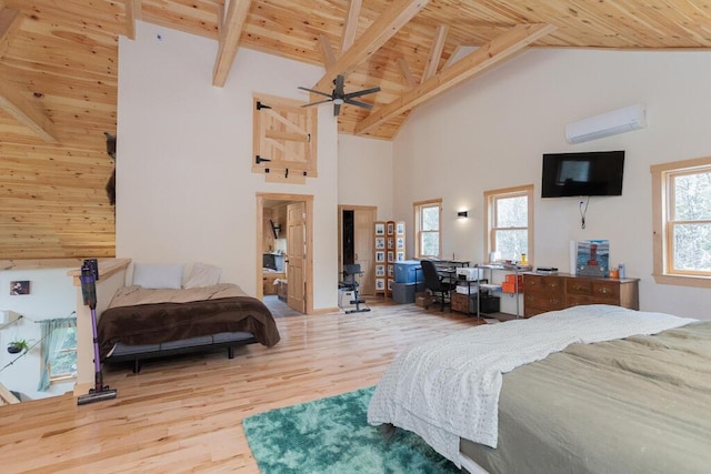26 Christen Rd, Kingfield, ME 04947 - bedroom featuring a wall unit AC, wooden ceiling, high vaulted ceiling, wood finished floors, and beamed ceiling