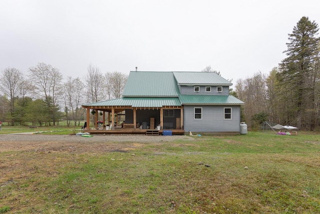 26 Christen Rd, Kingfield, ME 04947 - back of house with a yard and metal roof