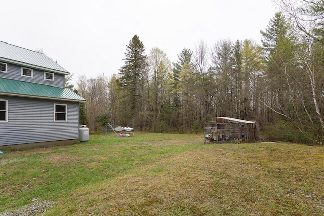 26 Christen Rd, Kingfield, ME 04947 - view of green lawn featuring a forest view