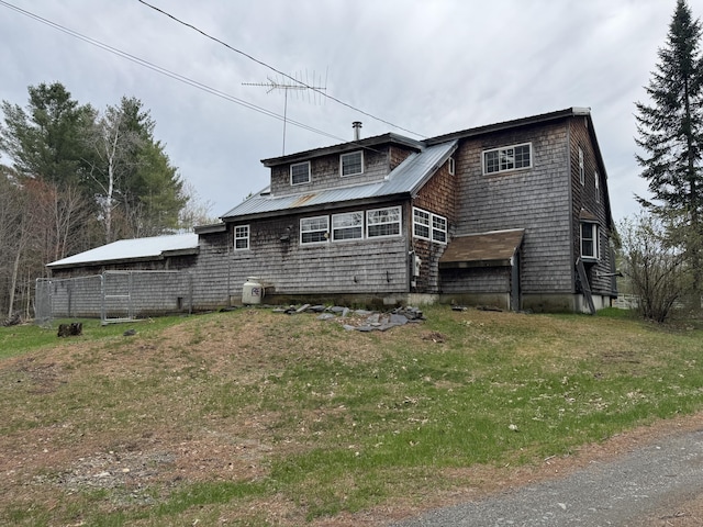 7 Howard Siding Ln, Abbot, ME 04406 - view of front of property featuring metal roof