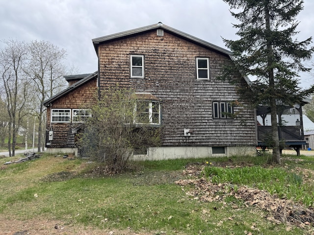 7 Howard Siding Ln, Abbot, ME 04406 - view of property exterior featuring a lawn