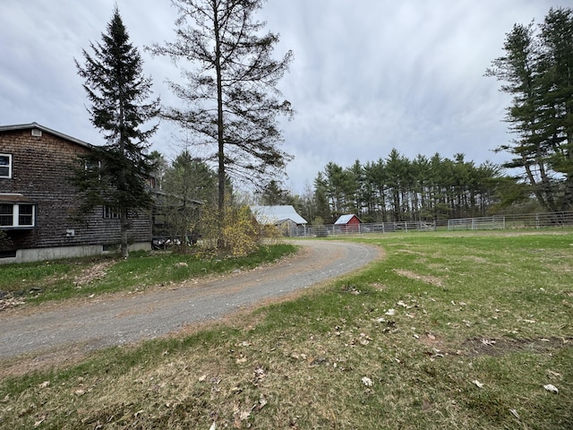 7 Howard Siding Ln, Abbot, ME 04406 - view of dirt / gravel driveway