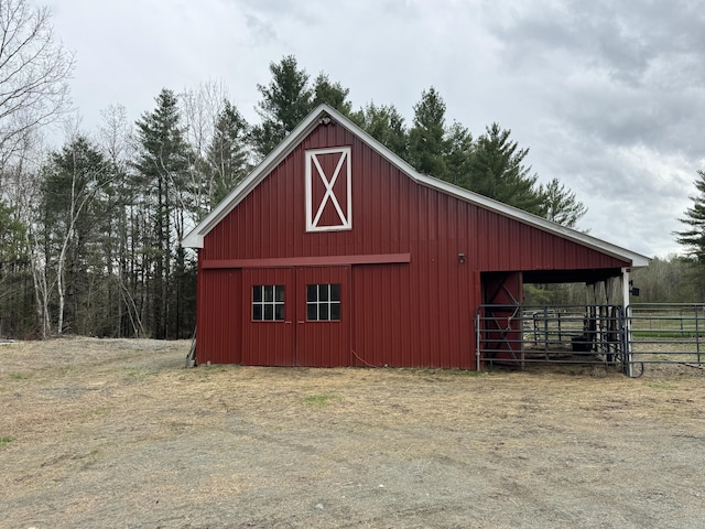 7 Howard Siding Ln, Abbot, ME 04406 - view of barn featuring fence
