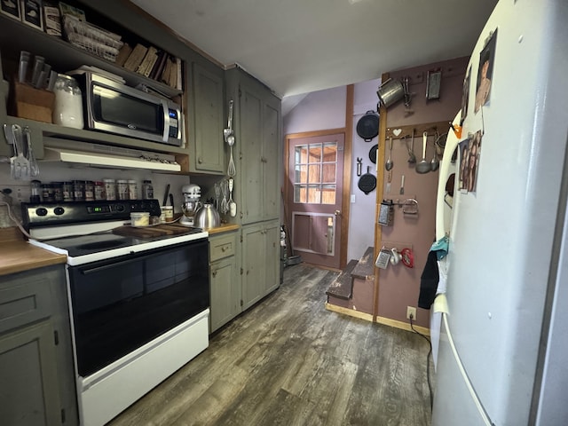 7 Howard Siding Ln, Abbot, ME 04406 - kitchen featuring range with electric stovetop, wood finished floors, stainless steel microwave, and light countertops
