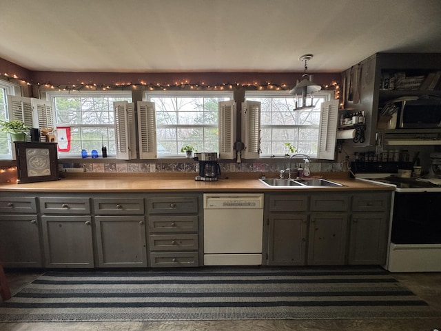 7 Howard Siding Ln, Abbot, ME 04406 - kitchen with dishwasher, range with electric cooktop, a sink, and gray cabinets