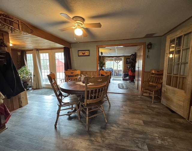 7 Howard Siding Ln, Abbot, ME 04406 - dining room with plenty of natural light, ceiling fan, a textured ceiling, french doors, and wainscoting