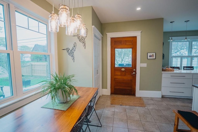 107 Maple St, Bangor, ME 04401 - doorway featuring a chandelier, light tile patterned floors, baseboards, and recessed lighting
