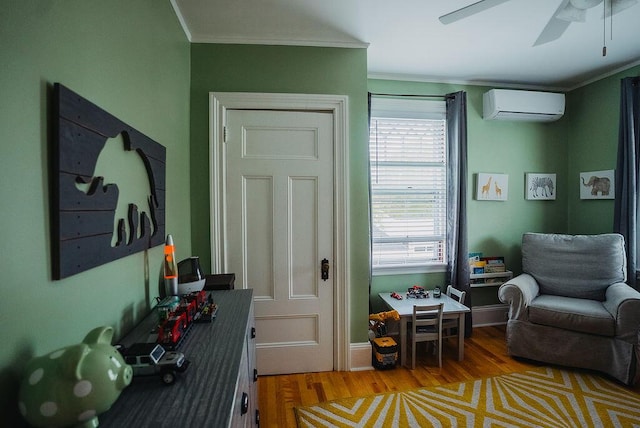 107 Maple St, Bangor, ME 04401 - living area featuring an AC wall unit, ornamental molding, light wood-style floors, ceiling fan, and baseboards