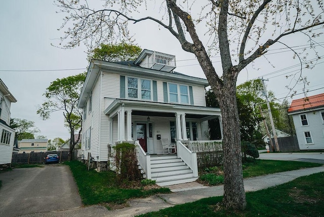 107 Maple St, Bangor, ME 04401 - american foursquare style home featuring covered porch and fence