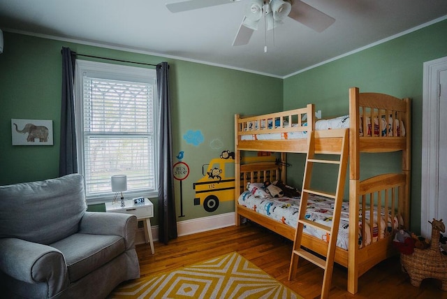 107 Maple St, Bangor, ME 04401 - bedroom with wood finished floors, ornamental molding, baseboards, and a ceiling fan
