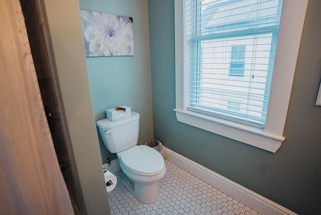 107 Maple St, Bangor, ME 04401 - bathroom with plenty of natural light, baseboards, and toilet