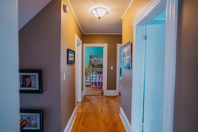 107 Maple St, Bangor, ME 04401 - hallway with light wood-style floors, ornamental molding, and baseboards