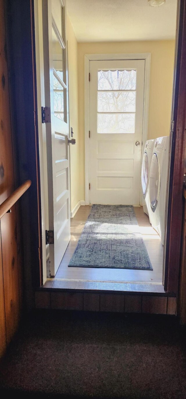 entryway with washer and dryer