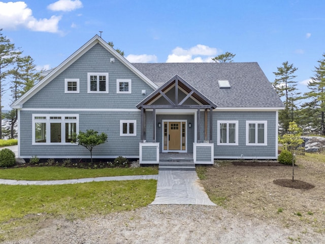 92 Brooks Cove Rd, Westport Island, ME 04578 - shingle-style home with a shingled roof and a front yard
