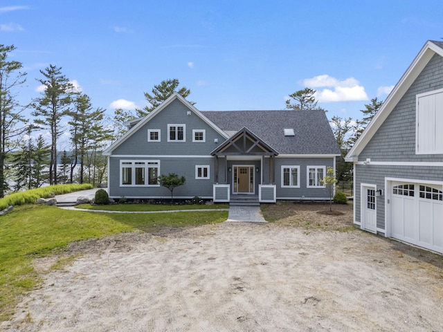 92 Brooks Cove Rd, Westport Island, ME 04578 - shingle-style home featuring a front lawn