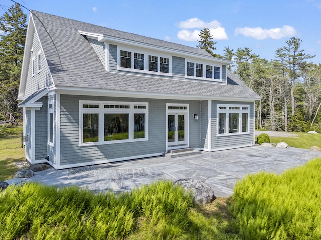 92 Brooks Cove Rd, Westport Island, ME 04578 - rear view of house with a patio area, a shingled roof, and french doors