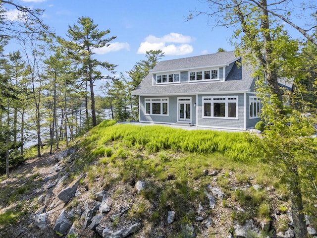 92 Brooks Cove Rd, Westport Island, ME 04578 - view of front of house with french doors and a shingled roof