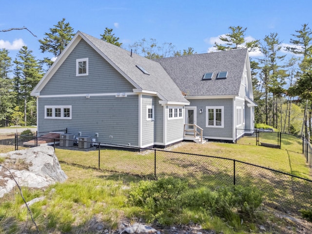 92 Brooks Cove Rd, Westport Island, ME 04578 - view of front of house featuring a shingled roof, a fenced backyard, and a gate