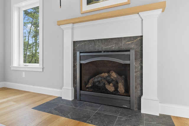 92 Brooks Cove Rd, Westport Island, ME 04578 - detailed view of a fireplace and wood finished floors