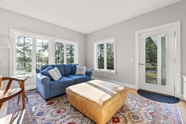 92 Brooks Cove Rd, Westport Island, ME 04578 - living area with healthy amount of natural light and light wood-style flooring
