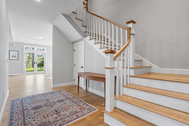 92 Brooks Cove Rd, Westport Island, ME 04578 - staircase with wood finished floors and baseboards