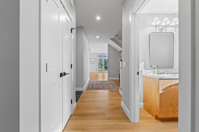 92 Brooks Cove Rd, Westport Island, ME 04578 - hall featuring light wood-type flooring and recessed lighting