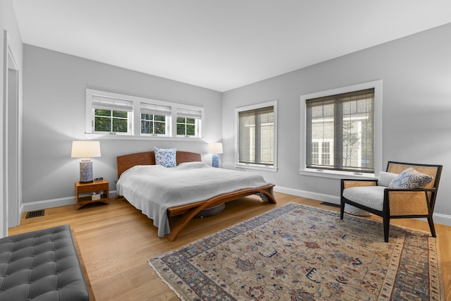 92 Brooks Cove Rd, Westport Island, ME 04578 - bedroom featuring baseboards and light wood-type flooring