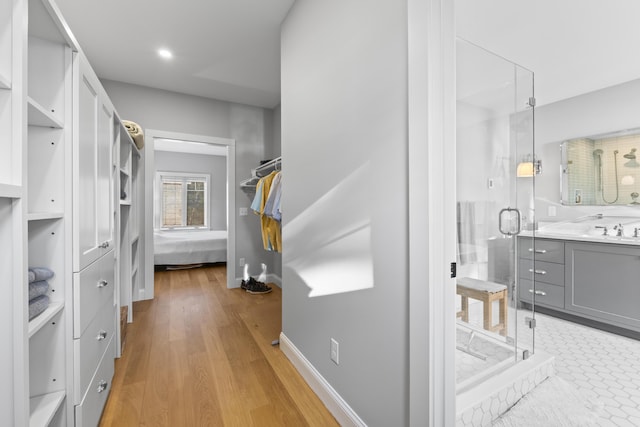 92 Brooks Cove Rd, Westport Island, ME 04578 - hall featuring light wood-style floors and recessed lighting
