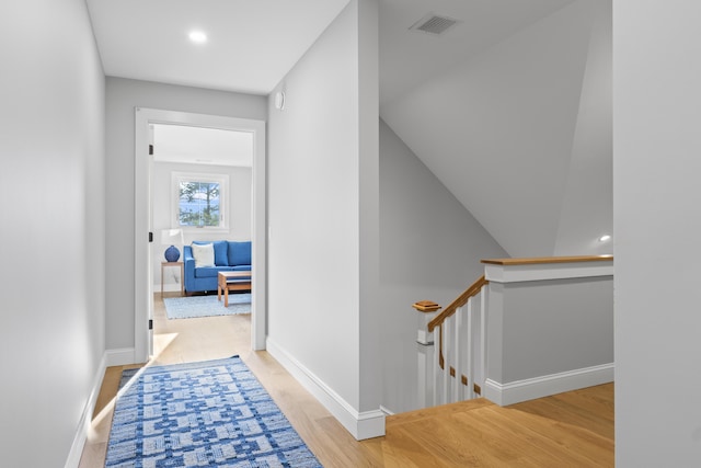 92 Brooks Cove Rd, Westport Island, ME 04578 - corridor featuring an upstairs landing, wood finished floors, and recessed lighting