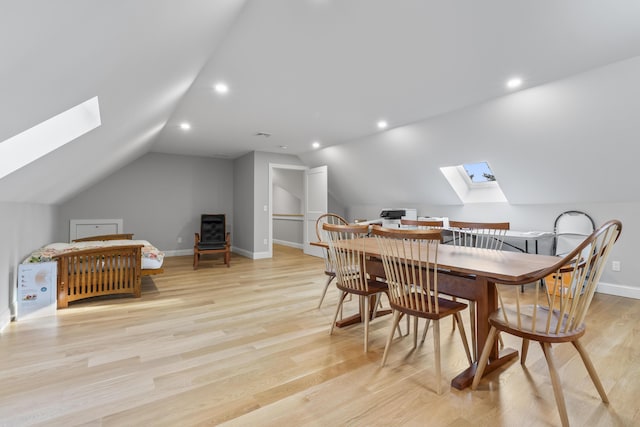 92 Brooks Cove Rd, Westport Island, ME 04578 - dining space featuring a skylight, lofted ceiling, light wood-style flooring, and recessed lighting