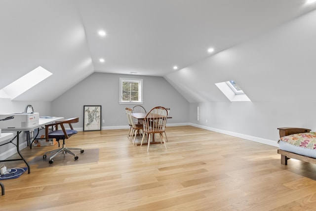 92 Brooks Cove Rd, Westport Island, ME 04578 - home office with a skylight, vaulted ceiling, light wood-style flooring, and recessed lighting