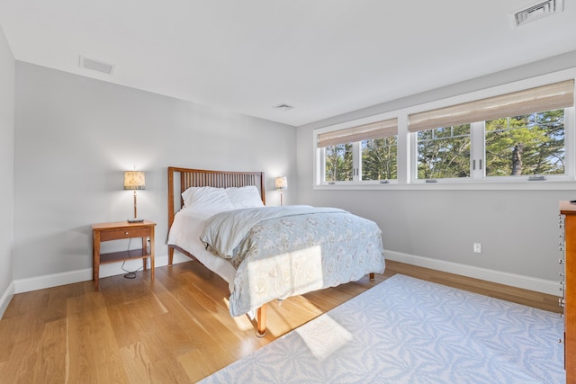92 Brooks Cove Rd, Westport Island, ME 04578 - bedroom with baseboards and light wood-style flooring