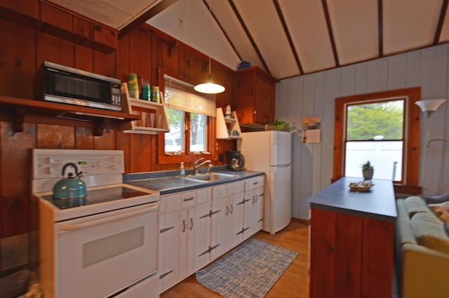 586 Kings Hwy Unit 2, Kennebunkport, ME 04046 - kitchen featuring white appliances, a sink, open shelves, light wood-type flooring, and white cabinetry