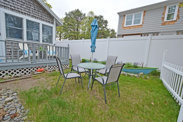 586 Kings Hwy Unit 2, Kennebunkport, ME 04046 - view of yard with a wooden deck and outdoor dining area