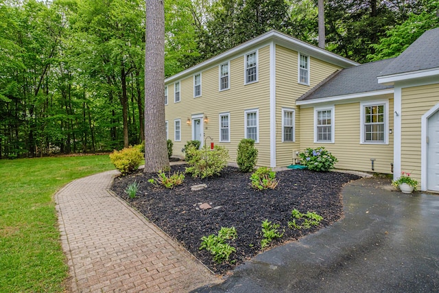 55 Evergreen Ln, Windham, ME 04062 - colonial-style house with a front lawn