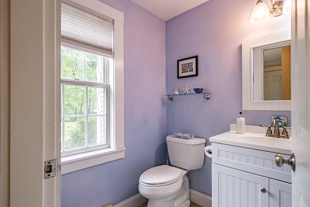 55 Evergreen Ln, Windham, ME 04062 - half bath with baseboards, toilet, and vanity